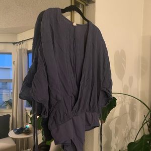 Blue cross over V body suit